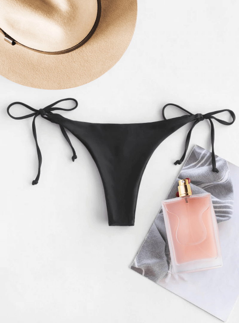 Black ladies swimwear bikini thong with High Cut Bottoms, mid-rise waist, on-trend high cut legs, moderate back coverage and available in size S, M, L.